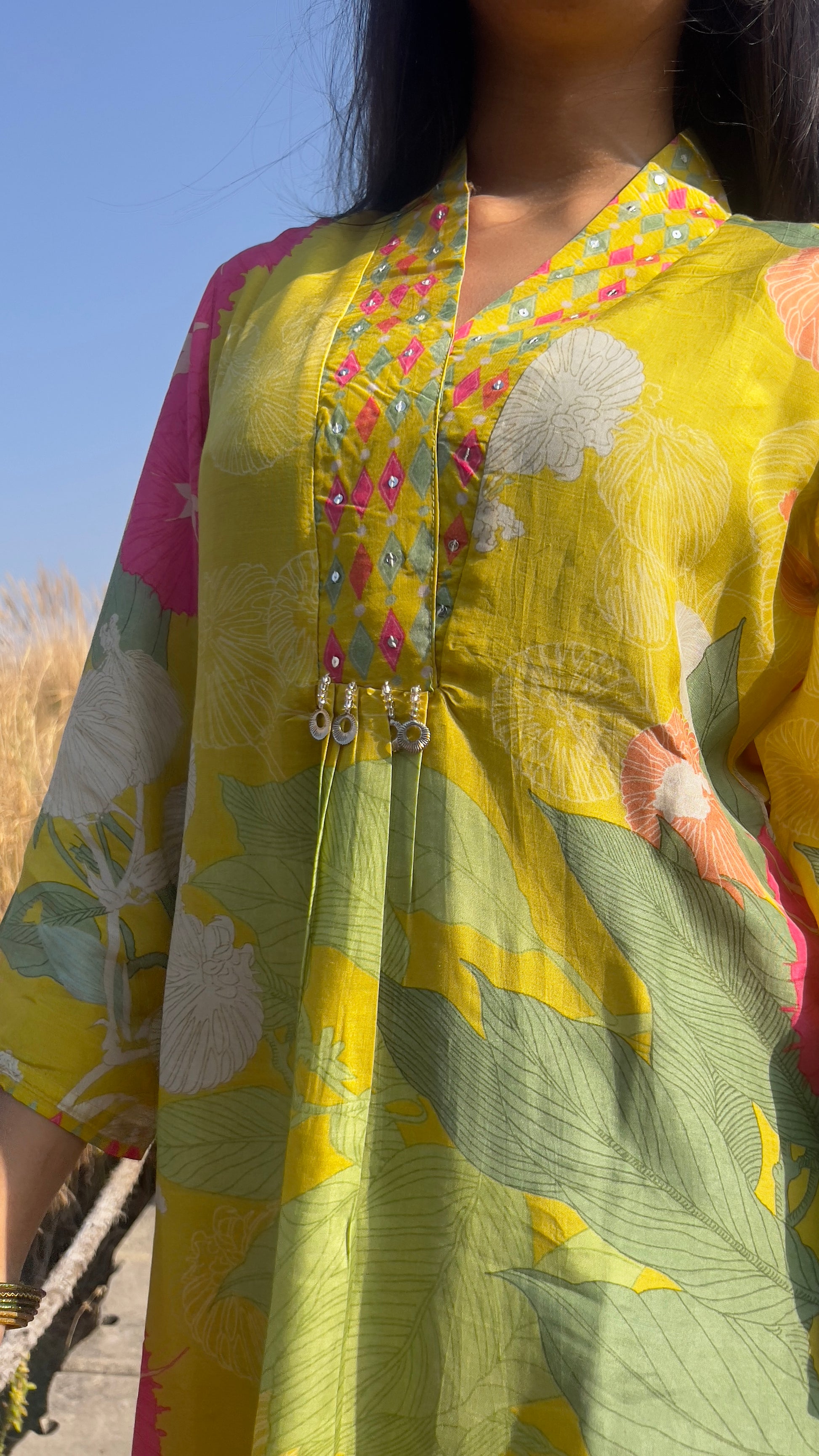 Lime green flower gloss set with hand-tied dye details, perfect for elevated casuals and organic comfort.