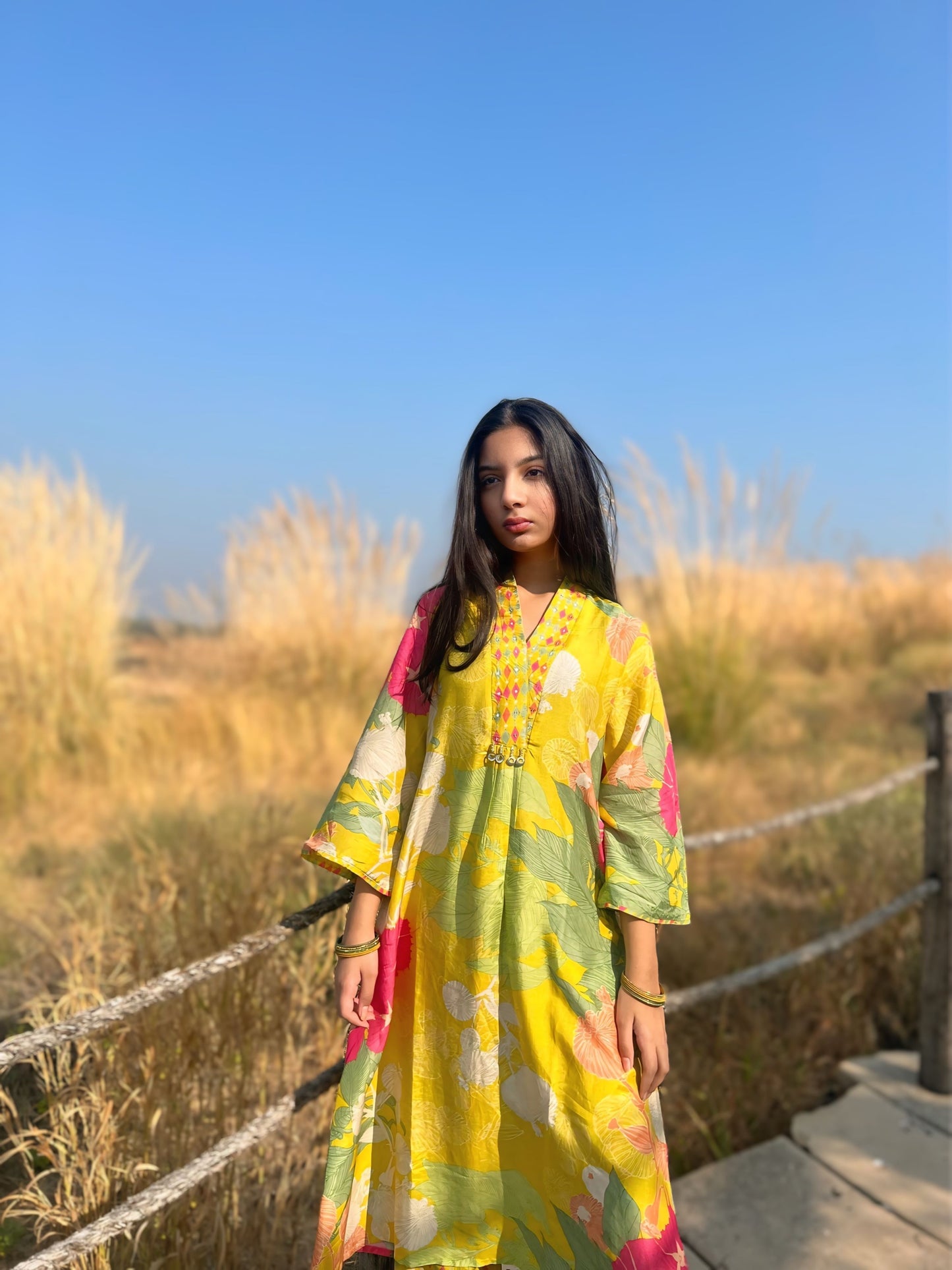 Model in a vibrant hand-tied dyed lime green floral coord set, perfect for elevated casual styling and outdoor occasions.